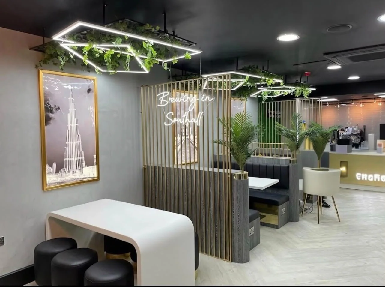 Café seating with slatted timber screens and a booth