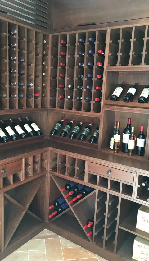 Walk-in wine room with timber racking